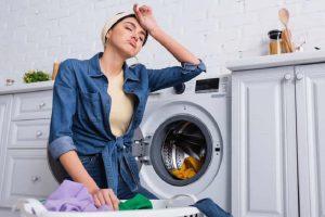 علت داغ شدن ماشین لباسشویی چیست؟ + ۱۰ علت آن